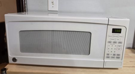 GE Spacemaker II 1.0 Cu. Ft. Countertop Microwave Oven 800w