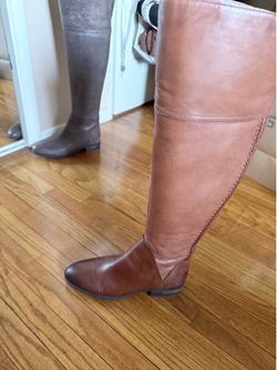 Brown leather knee high boots