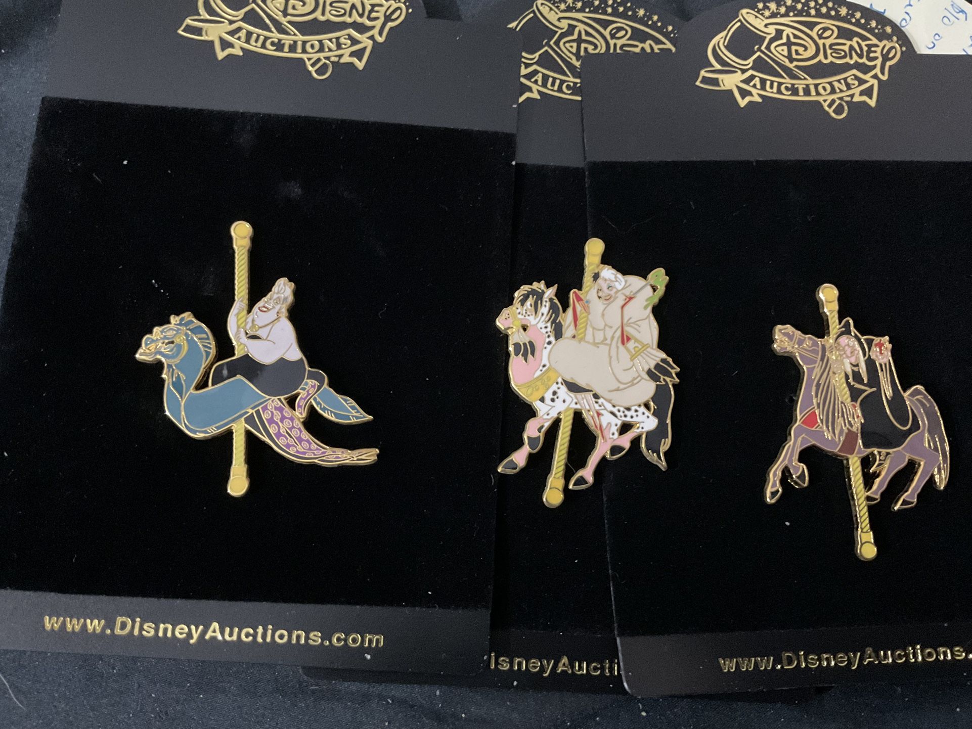 Disney Villains Riding a Carousel Pin