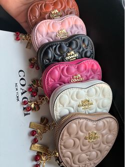 cute wristband purses available 💕✨