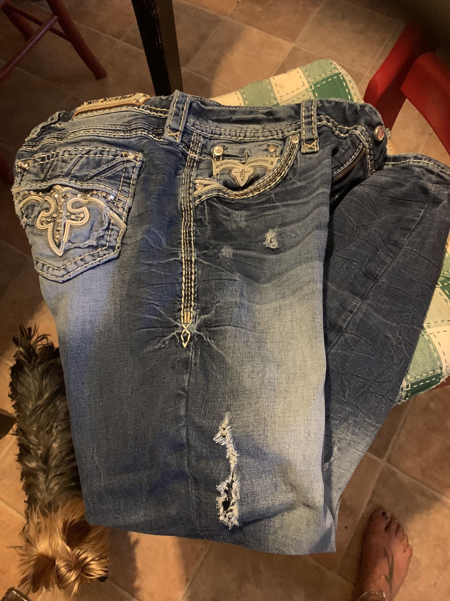 Distressed Rock Revival Jeans. 