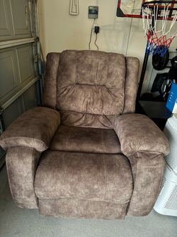 Brown recliner rocking chair