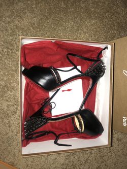 Red bottoms woman size 8.5