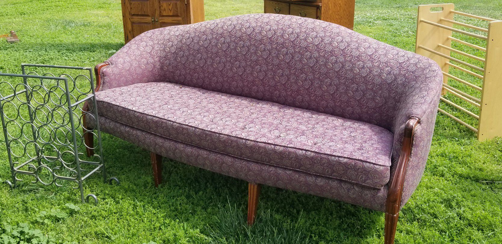 Antique loveseat. Middle leg broke. Will need cleaned or reupholstered. No rips or tears.