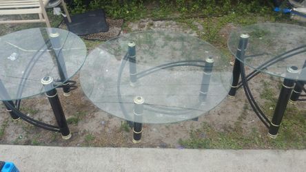 Three glass tables