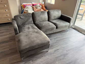 Free gray microfiber sofa with chaise