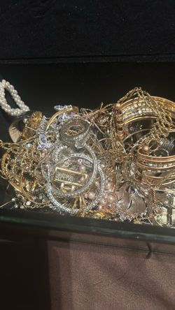 Jewelry box full of very vintage, gold tone, wearable costume, jewelry beautiful pieces are wearable