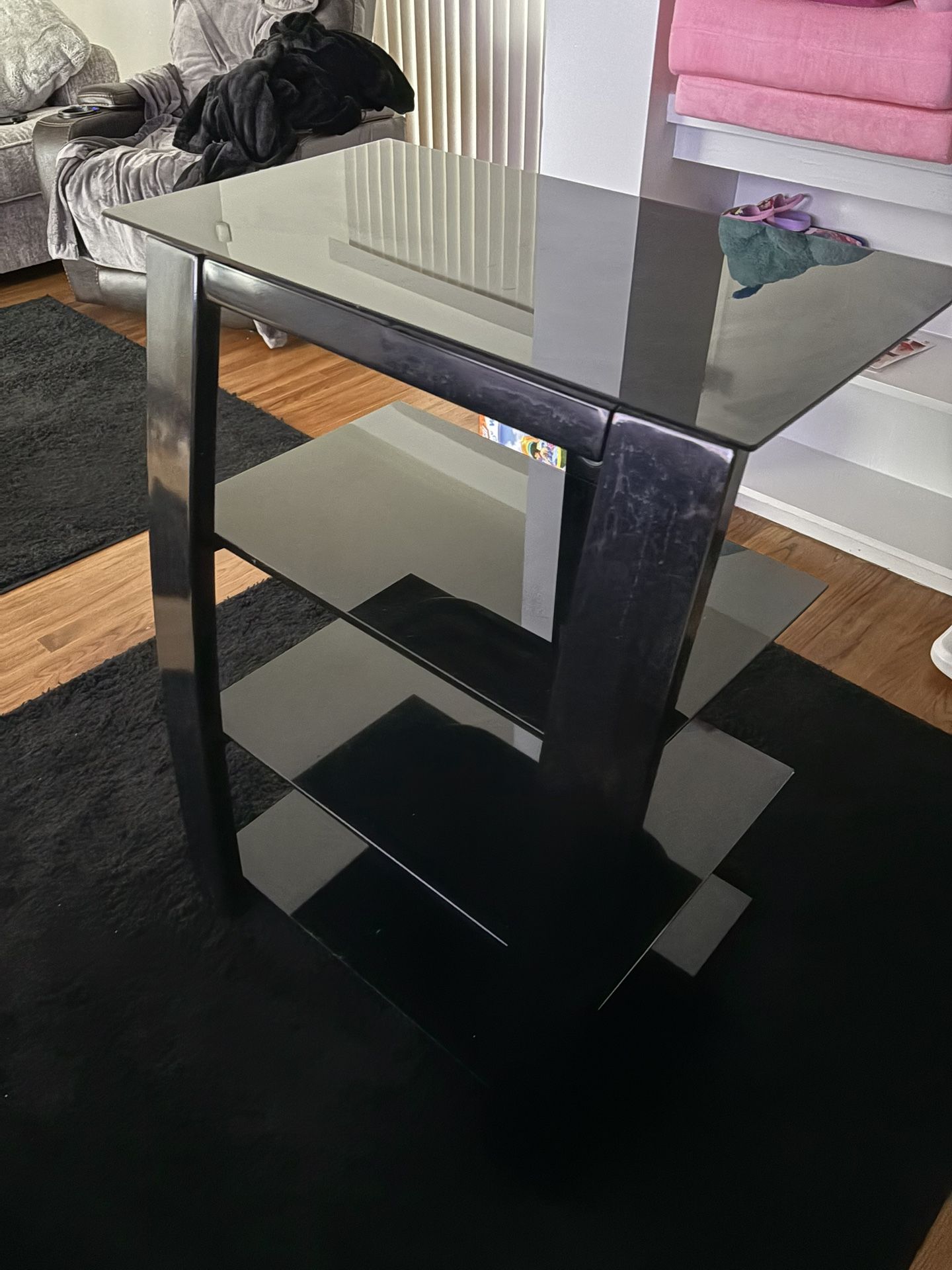 4 Shelves Black Glass TV stand.
