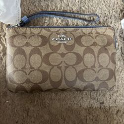 New Coach Wristlet 30$ Firm 