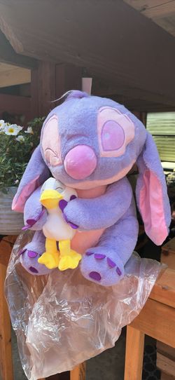 Disney Stitch Plush Holding Duckling and light blanket inside