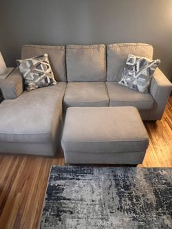 Reverse Sectional Couch , Chair And Ottoman 