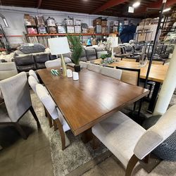 New 9-piece dining set. Table+8 chairs