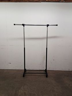 Adjustable height garment rack with wheels pickup 2-8:30 pm rainbow/charleston cash only