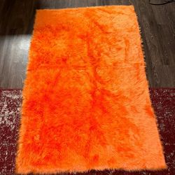 shaggy faux fur orange rug