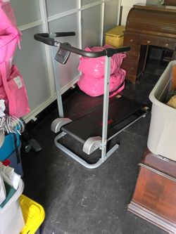 Young adult self propelled exercise treadmill