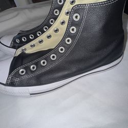 Black and white leather high top converse size 9.5