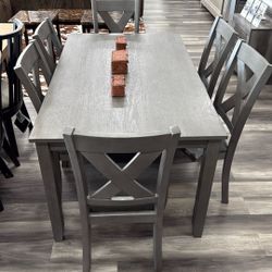 Caitbrook Dining Table With 6 Chairs $700