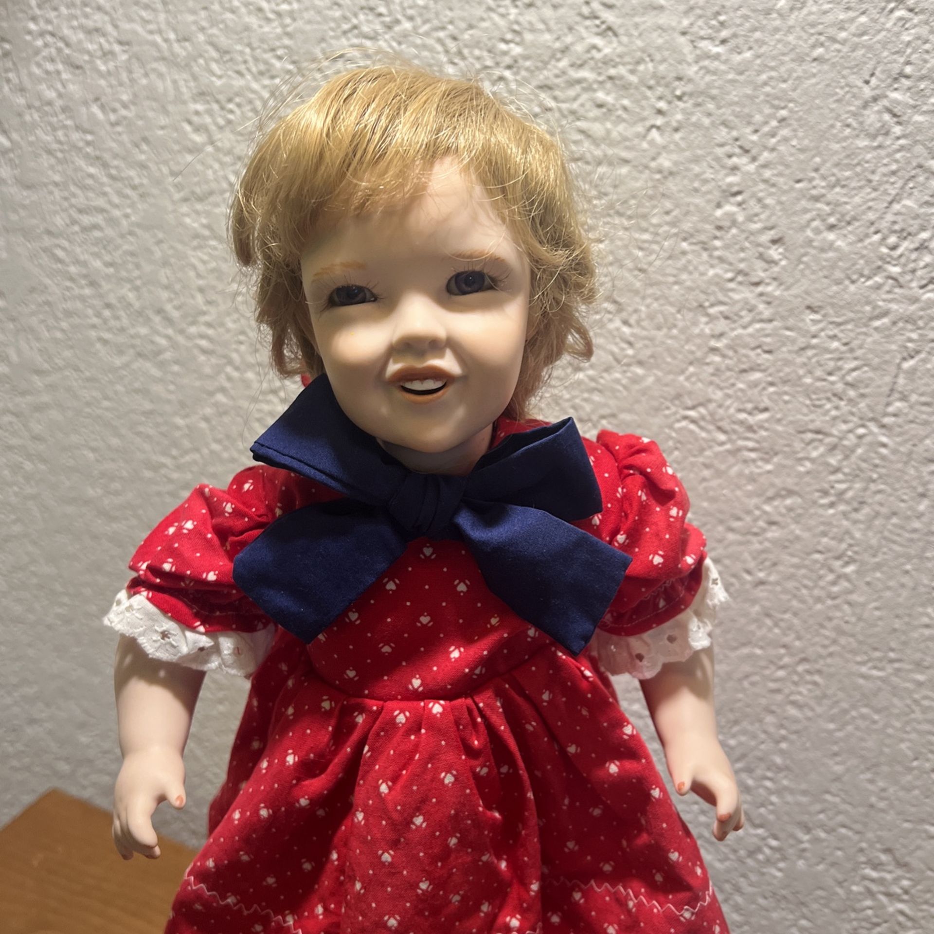Porcelain Doll With Stand