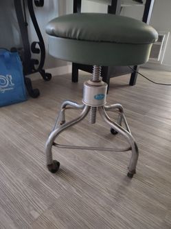 Pedigo  Adjustable Rolling Stool with Green Cushion