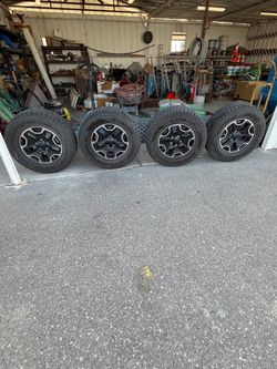 Stock jeep wrangler rims and tires