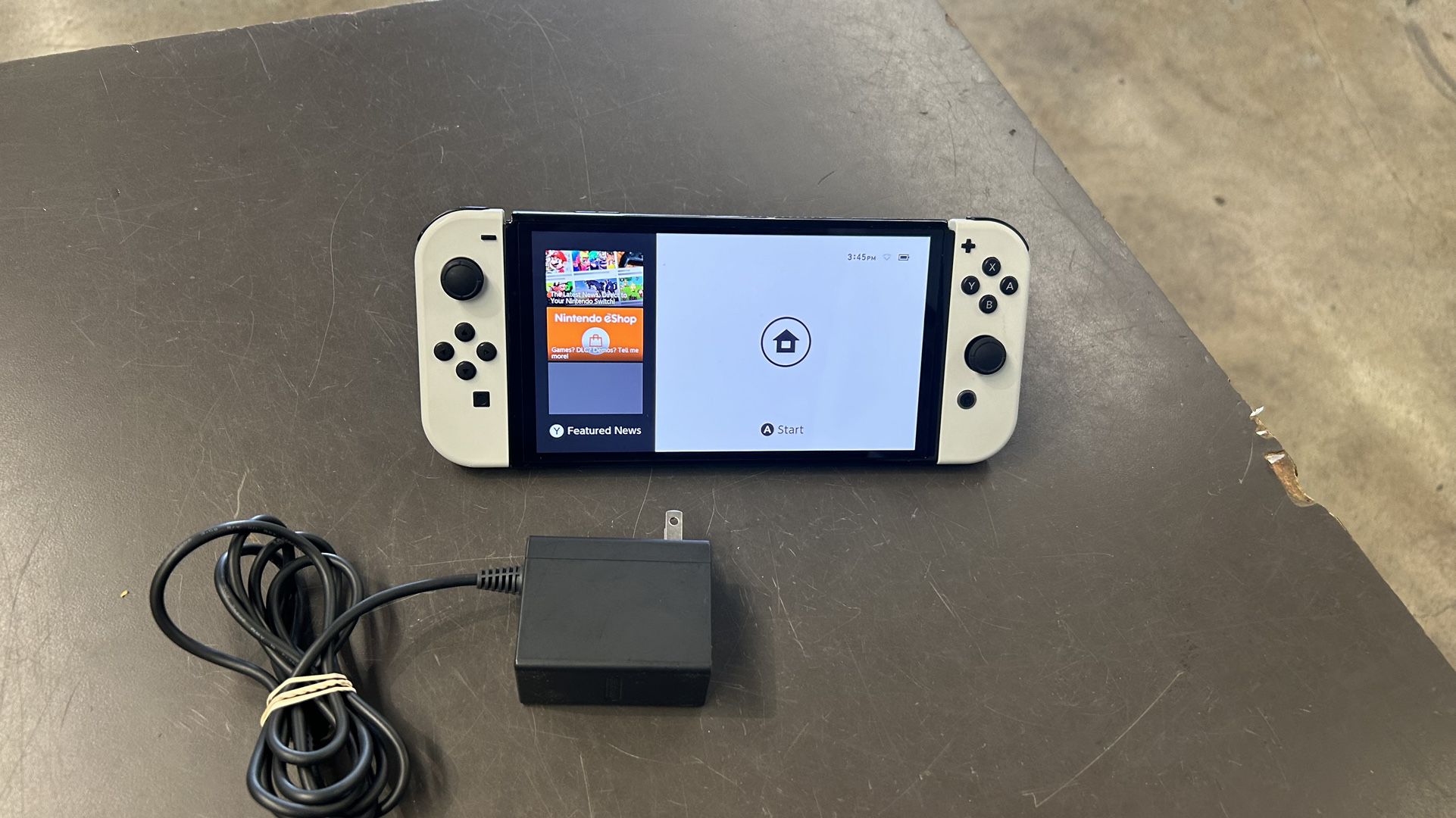Nintendo Switch OLED w chwrger no dock station no trades pick up in Tacoma FIRM PRICE