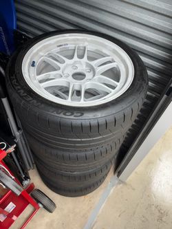 Enkei RPF1 Vanquish White 17x9 35mm with Continental extreme contacts 245 x 40 R17