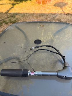OEM tiller handle assembly pulled from a 1993 Mariner 15 HP 2-stroke outboard, serial 0D247861.