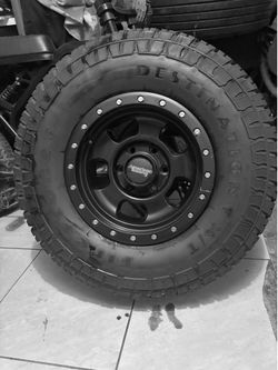 American Racing off Roading Set of 4 wheels and tires.
