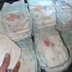80 Huggies Diapers ( Sz 1)