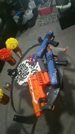 NERF ELITE AND 2 NERF RIVALS WITH ONE MAG AND DARTS