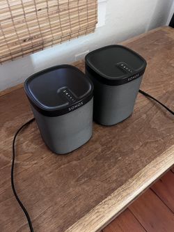 Two Sonos Play 1 speakers
