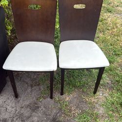 Two wooden brown chairs set
