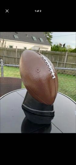 Life-size football coin, bank statue
