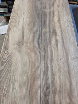 STAINMASTER PetProtect Forest City Pine 12-mm T x 7-1/2-in W x 47-1/4-in L Waterproof Laminate Wood Flooring ( 22.09-sq ft / Carton )