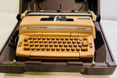 Smith-Corona Coronet Super 12 Electric Portable Typewriter & Case Coronamatic