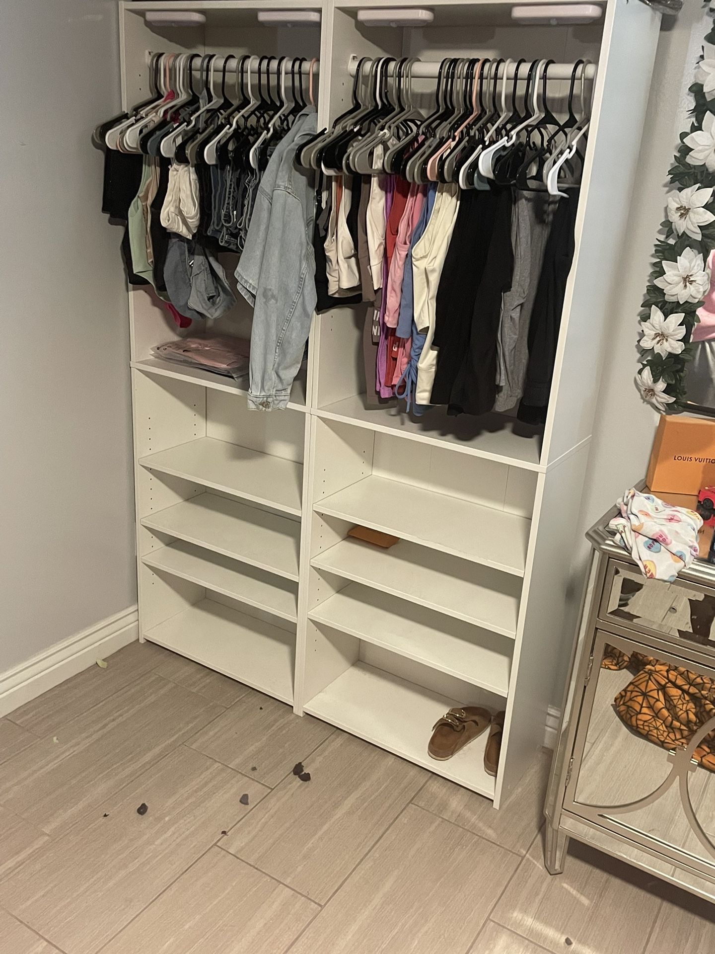4 Closet Organizers With Automatic Lights Installed
