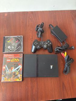 Sony PlayStation 2 with 2 games