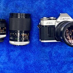 Canon AE-1 Camera SLR Film Cam 50mm 135mm 70-150 Lens Combo Kit Handheld Vintage Classic Photo Photography Outdoors Hobby Travel Detachable 