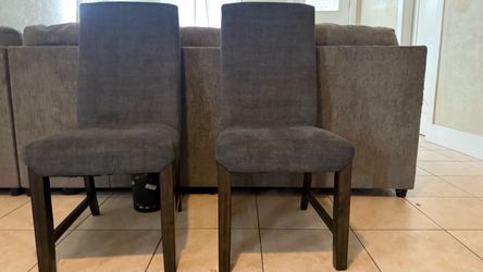2 grey chairs