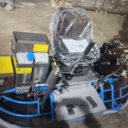 Ride on concrete power finisher.