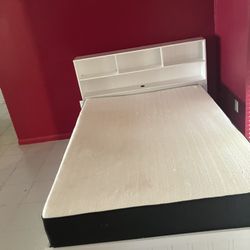 White Full Size Bed With Mattress And Storage Drawers Underneath And Shelves For Headboard 
