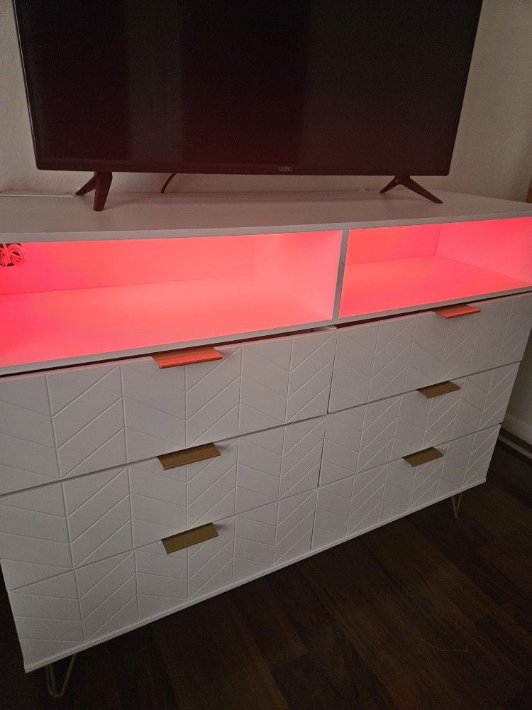 Dresser TV Stand. Synthetic Grass Vaccum Bot