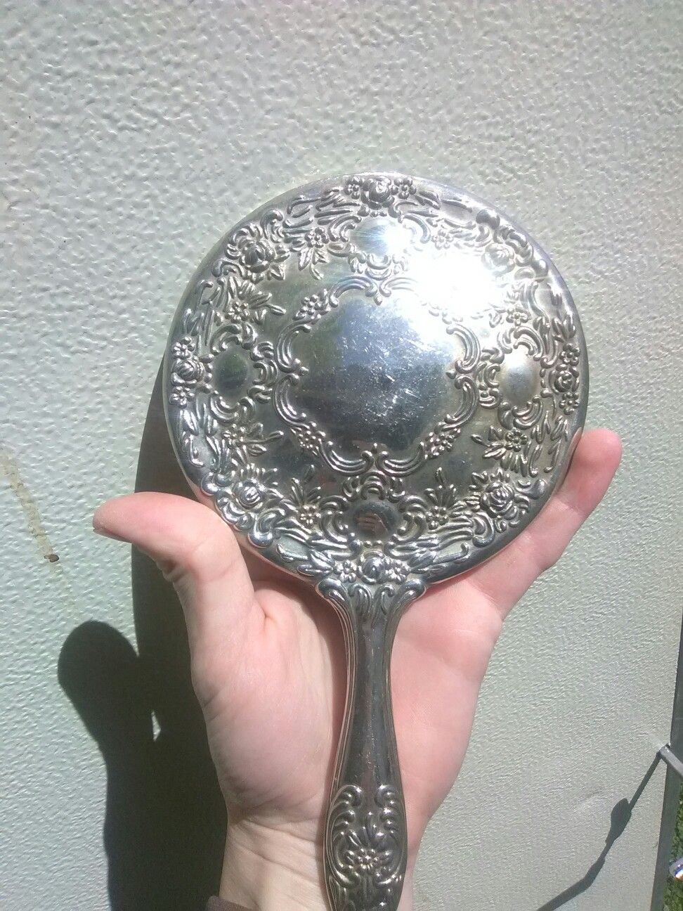 Antique handheld mirror