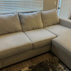 Grey Living Spaces Couch W/Chase