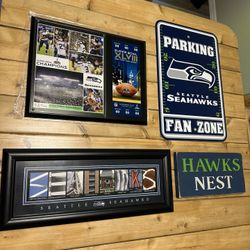 * 4x Seattle Seahawks Memorabilia pieces! Super Bowl plaque, Seahawks picture frame, Hawks block, and a Seahawks Parking sign. These are big pieces 