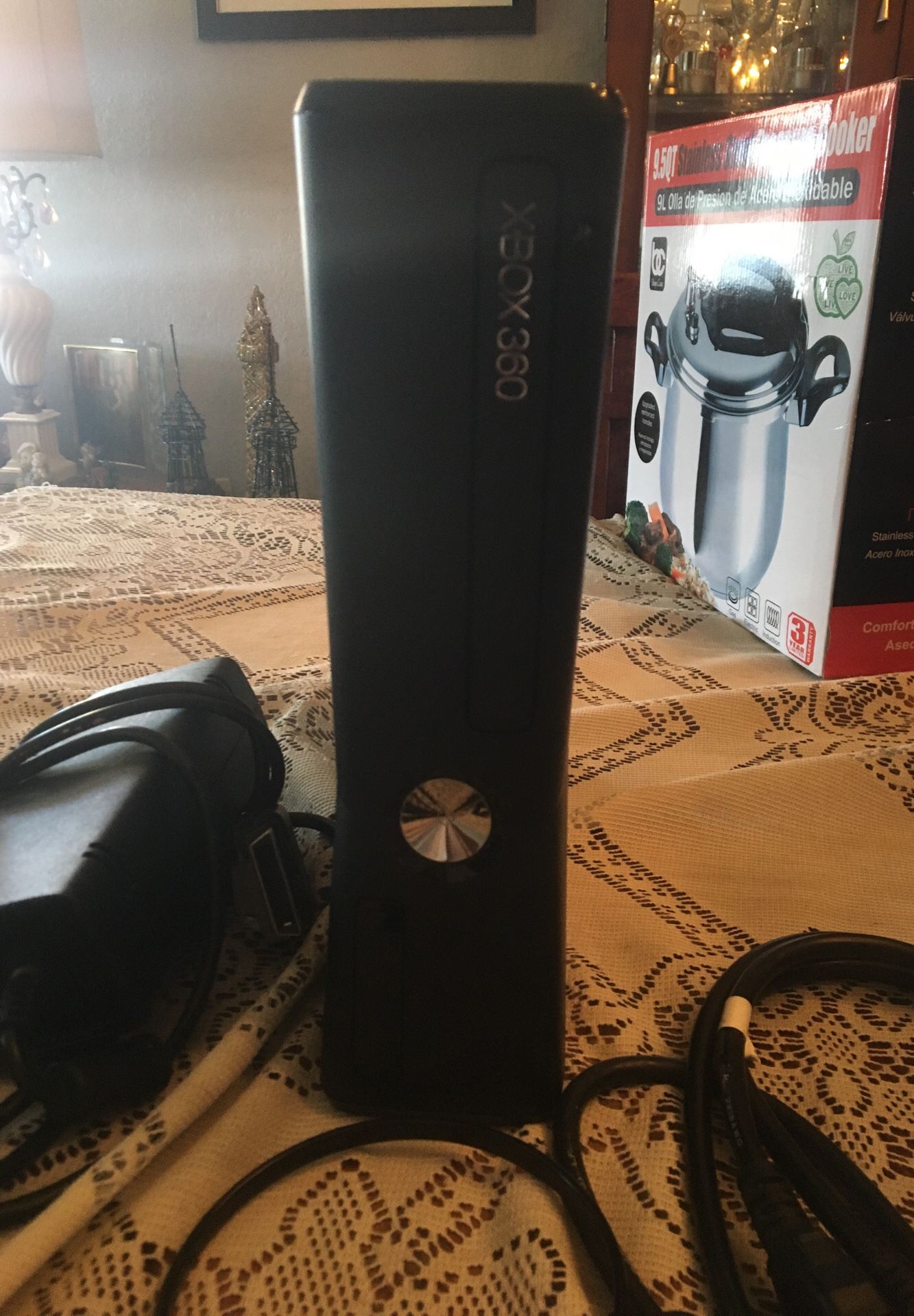 Xbox 360 with two headphones for online playing