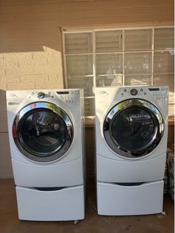 Whirlpool front load washer & dryer w/ both pedestal stands duet steam clean