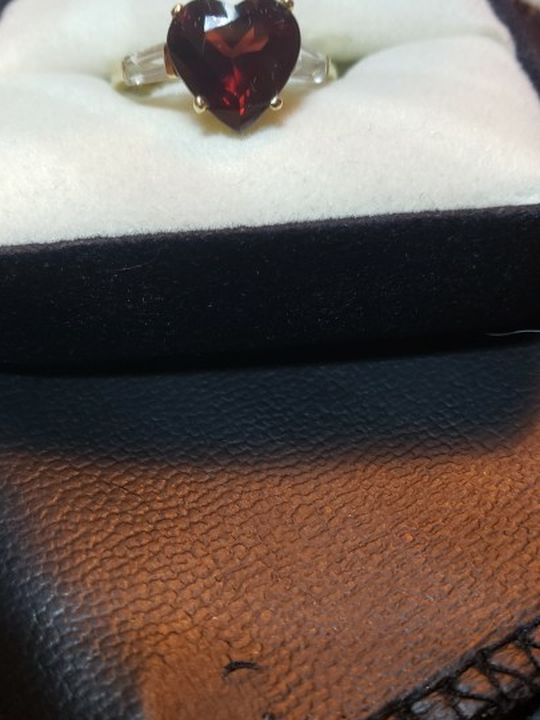 14kt Garnet Faceted Heart Shaped Ring With White Topaz Bagette On Sides