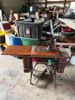 Antique Singer Treadle Sewing Machine with Cabinet
