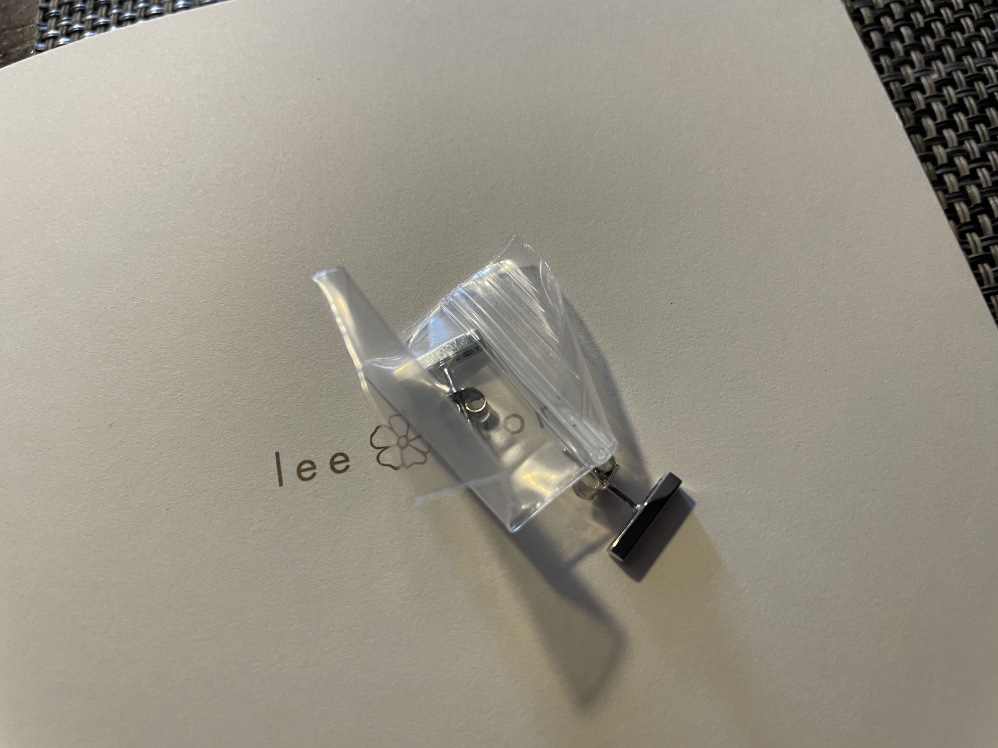 lee fiori bar stud earrings 10k white gold new, in package never worn.